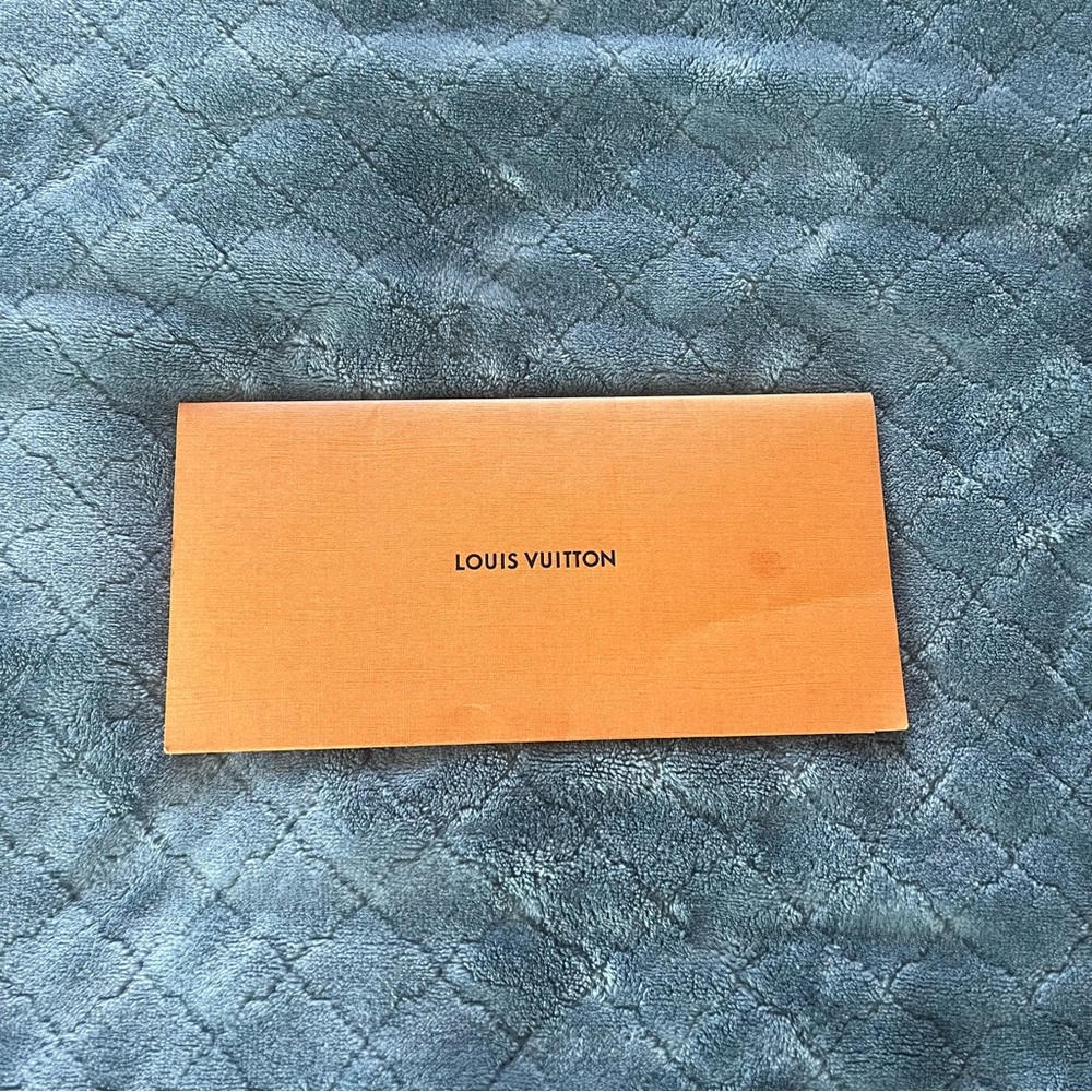 Louis Vuitton Orange Paper Receipt Holder‎